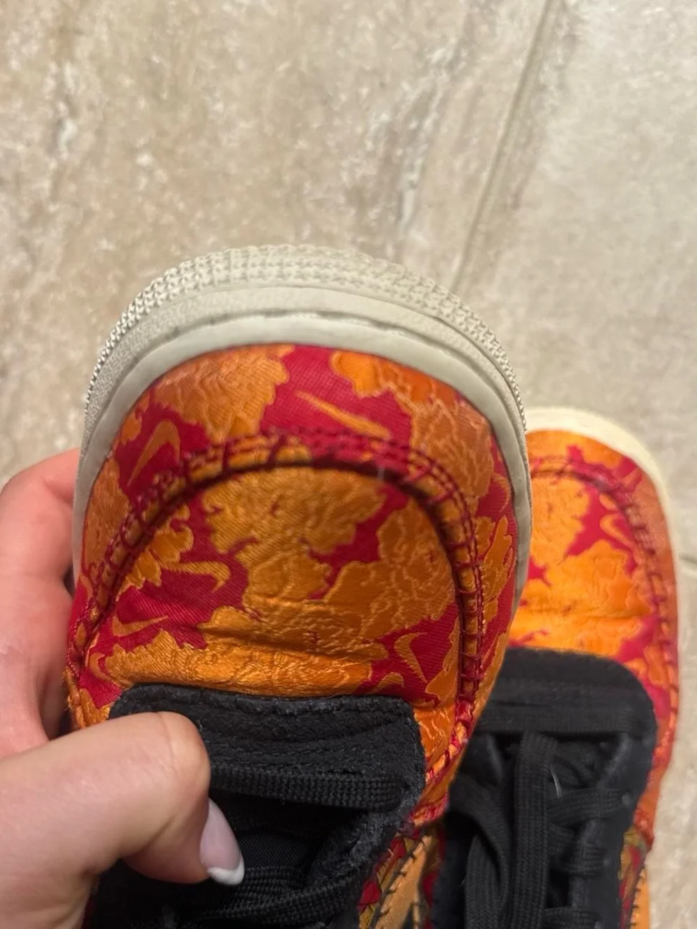 Nike Kid’s Low-Top Sneakers in Red & Orange